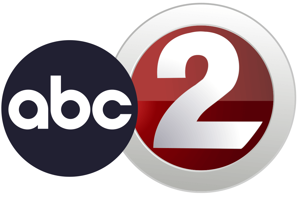 Two overlapping circular logos; the left one in dark blue with lowercase "abc," the right in white and red with the number "2.